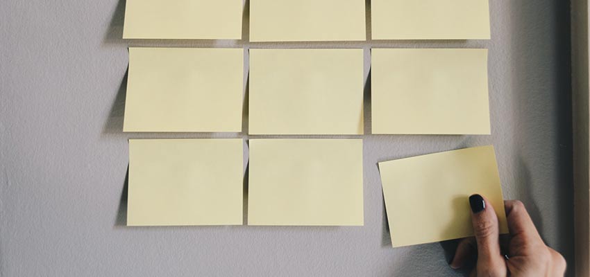 Sticky notes arranged on a wall.