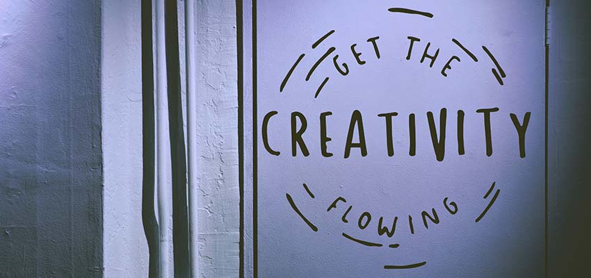 A poster that reads, "Get the Creativity Flowing".